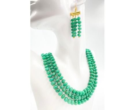 A three rows necklace and earrings set, with antique, oriental, green jade, individually, hand carved, gourd shaped beads. In