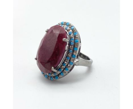 A Ruby, Turquoise and Diamond Silver Ring. 18.5ct Ruby. 1ct Turquoise. 0.55ct Diamond. Size P. 10g 