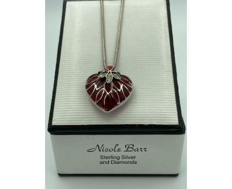 DIAMOND SET SILVER and enamel pendant from designer Nicole Barr in ? plique a jour? style. Having a deep red enamel pendant w