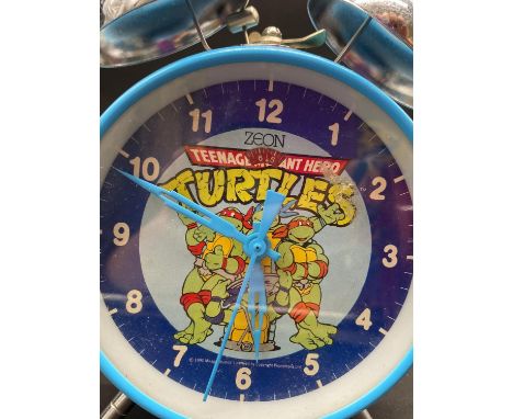 A Zeon Teenage Mutant Ninja Turtles Double Bell Alarm Clock. In working order. 