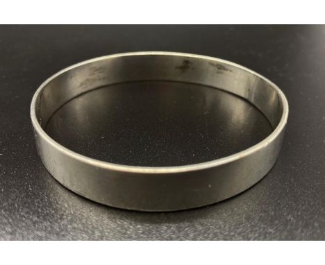 A Silver Bangle. 6.5cm diameter. 29.8g 