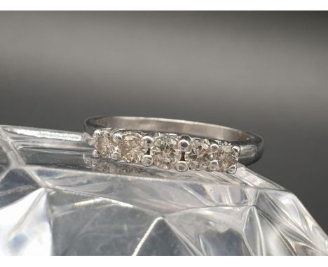 An 18k White Gold Diamond Five Stone Ring. Size P. 0.5ct. 3.2g 