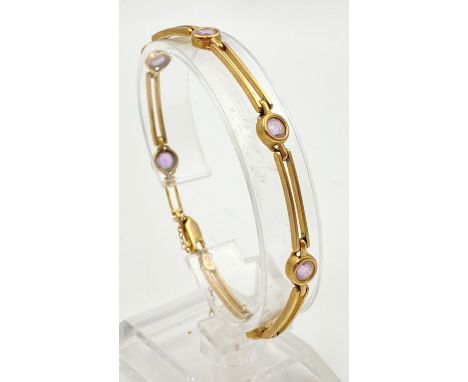 A Vintage 9K Yellow Gold and Amethyst Link Bracelet.22cm. 7.56g 