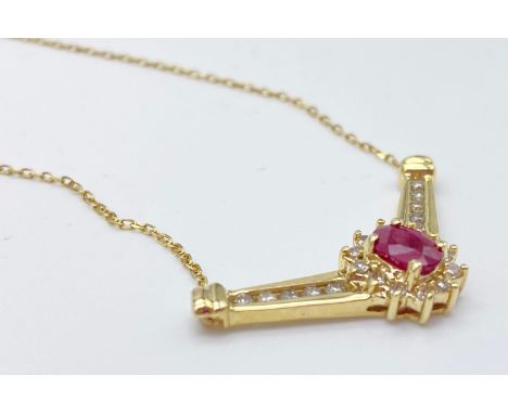 A VERY FEMININE 18K GOLD NECKLACE WITH DIAMONDS  AND RUBY.  2.9gms    45cms 