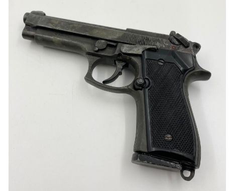 Replica Vintage Beretta Handgun. With slide out magazine, heavy metal feel. Dry firing action, takes inert shells in magazine