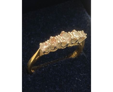 18 carat gold ring having five diamonds to top total 1/3 carat. Clear hallmark for London 18 carat gold.3.4 grams. Size N 1/2