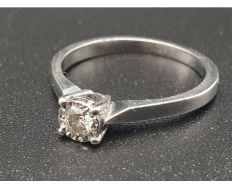 A 9k White Gold Diamond Solitaire Ring. Size L. 1.8g 