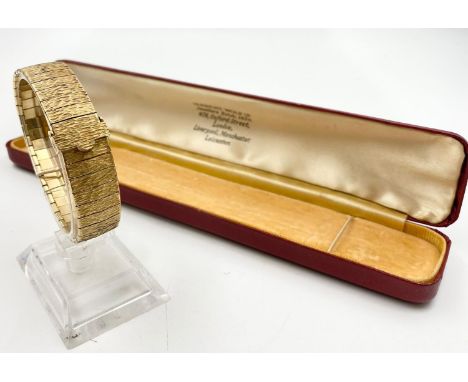 A Vintage 9k Yellow Gold Textured-Link Bracelet from Herbert Wolf of London. Comes in original box. 18cm. 18.5g 