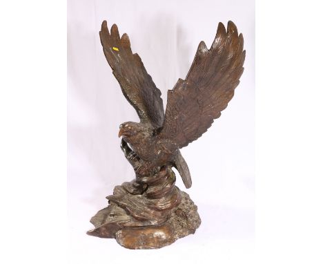 Large cast metal model of an eagle with outstretched wings, 73cm tall