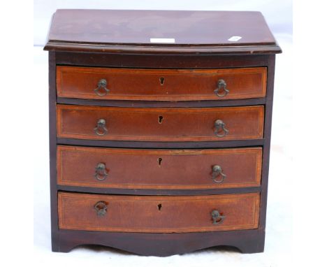Late 19th century mahogany apprentice bowfront chest, the moulded top over crossbanded graduated long drawer raised on bracke