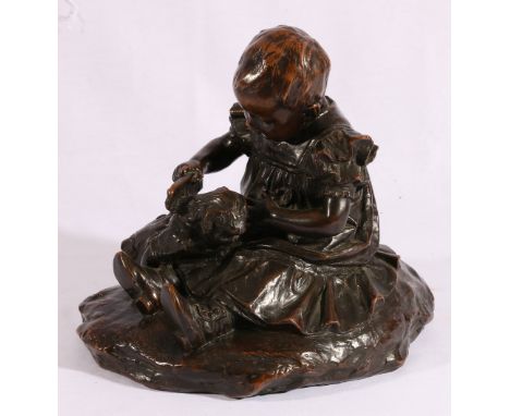 BERNHARDT SCENSEN? Girl combing a doll's hair Bronze, signed and dated 1905, 25cm