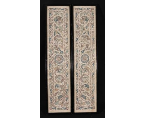 Pair of Chinese 19th century sleeve panels worked mainly in fine Pekin knots,. 11.5cm x 53cm   CONDITION REPORT:  Panel 1Stai