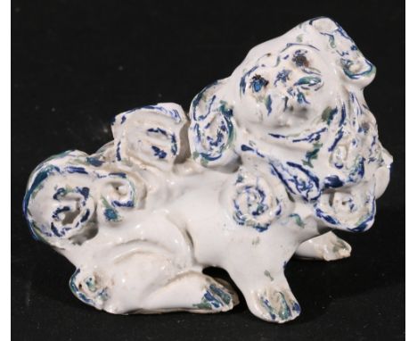 Japanese Hirado ware model of a shi shi dog, the white glaze highlighted with blue and green, 12.5cm. CONDITION REPORT: Tiny 