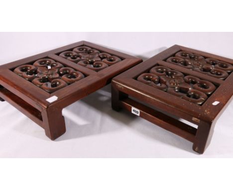 Pair of nicely carved Chinese heavy hardwood stools, late 19th or early 20th century pierced and carved apron with flower and