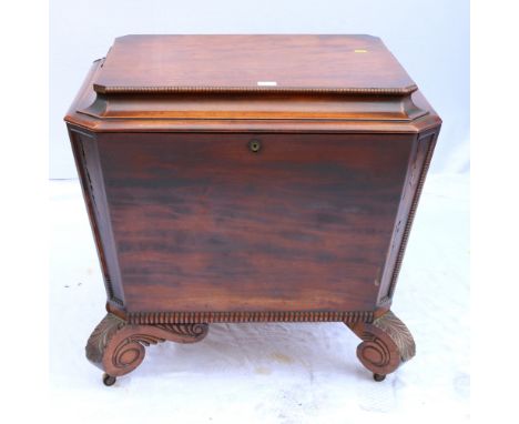 Late Regency mahogany sarcophagus cellerette, of rectangular form, the beaded stepped cover with canted corners enclosing com