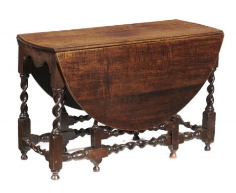 AN OAK DROP LEAF TABLE, 18TH C AND LATER  the oval top on spiral turned gate action legs, 72cm h; 115 x 145cm++Centre part of