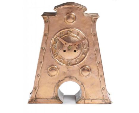 AN ARTS &amp; CRAFTS SHEET COPPER MANTEL CLOCK, C1905  of riveted construction and hammer textured, repoussé chapter ring and