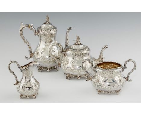 A VICTORIAN EPNS TEA AND COFFEE SERVICE, C1870  with eagle's head spout and crisply chased with flowers, initialled W, coffee