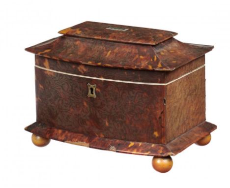 A VICTORIAN BOW FRONTED TORTOISESHELL TEA CADDY, C1840   with pagoda lid, the divided interior with pair of covers,  on veget