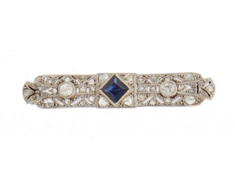 AN ART DECO SAPPHIRE AND DIAMOND BAR BROOCH, C1930  millegrain set in platinum, 3.2cm, Garrard &amp; Co Ltd case, 2.3g++As ne