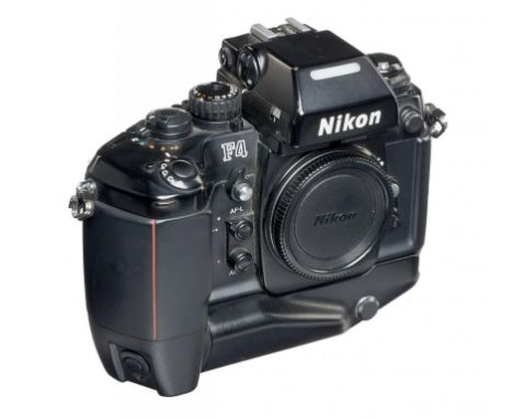 A NIKON F4 CAMERA BODY  No 2252282   with multi control back MF23 and motor drive MB21++Base with wear and light scratches.  
