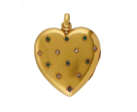 A HEART SHAPED GOLD LOCKET, C1900 the front set with a pattern of emeralds and rose diamonds, interior hinged compartment, 3.