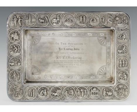 A FINE INDIAN SILVER REPOUSSÉ SWAMI STYLE TEA TRAY, LATE 19TH/EARLY 20TH C with engraved border surrounded by twenty six scen