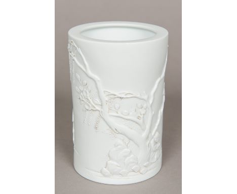 Attributed to WANG BING RONG (1840-1900) Chinese, a Chinese blanc de chine porcelain brush pot
Worked with a figure seated be