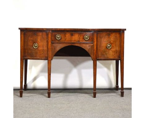 George III mahogany bowfront sideboard, fitted with central drawer flanked by two deep drawers, ebony outlines, square taperi