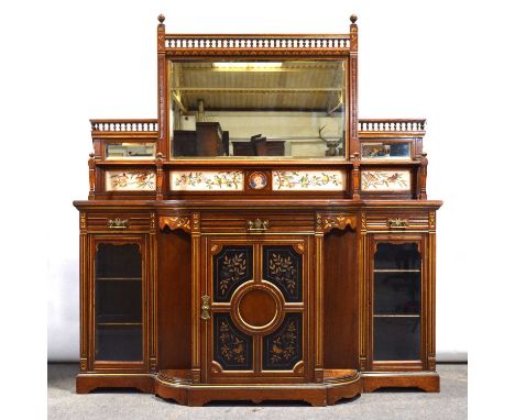 Late Victorian Aesthetic Movement sideboard, raised back with bevelled glass panels above tiles and a painted roundel with po