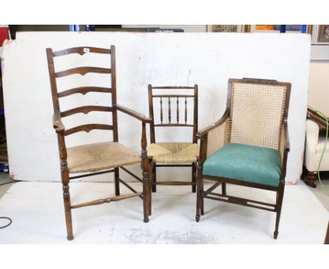 Three Chairs including William Morris style Sussex Rush Seat Chair, Oak Ladder Back Elbow Chair and an Early 20th century Ber