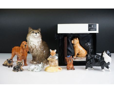 Collection of nine porcelain animal figures to include a boxed Royal Doulton Animals Chow Chow no. 13703, 2 x Beswick (seated