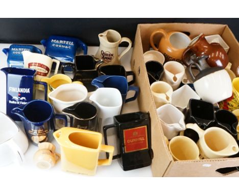 Collection of 39 branded ceramic advertising water jugs to include many whisky examples, to include Martell Cognac, Bell's, Q