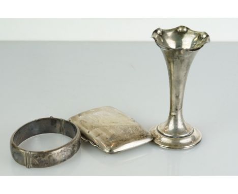 A small group of fully hallmarked sterling silver to include a cuff bangle, cheroot case and a bud vase with weighted base. 