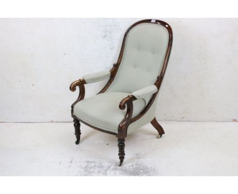 Victorian Armchair with pale green button back upholstery and open Rosewood Show Frame, raised on turned tulip carved front l