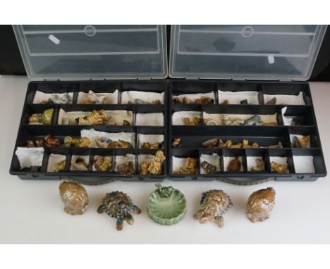 Collection of over 55 Wade Whimsies contained within two plastic cases, to include squirrels, cats dogs, hippos, etc together