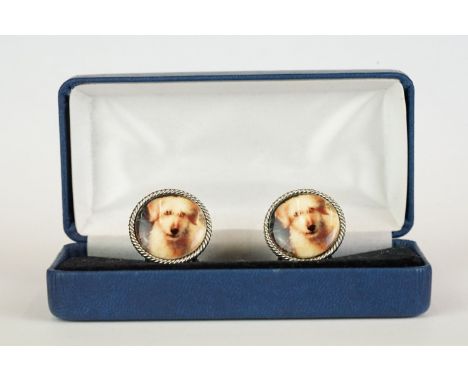 Pair of silver and enamel set cufflinks depicting dogs 