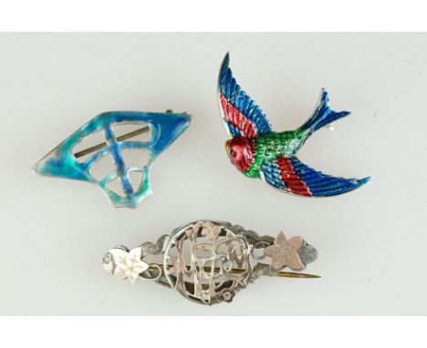 A collection of three sterling silver brooches to include a fully hallmarked sterling silver and enamel Art Nouveau example, 