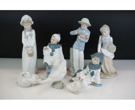 Eight Spanish porcelain figures to include Nao by Lladro (boy holding a puppy, girl with basket of flowers, a goose and two d