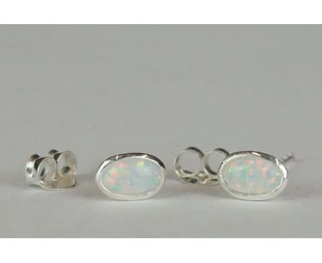 Pair of silver and opal stud earrings 