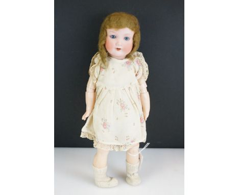 Armand Marseille bisque headed doll with sleeping blue eyes and painted face, markings to back of neck 