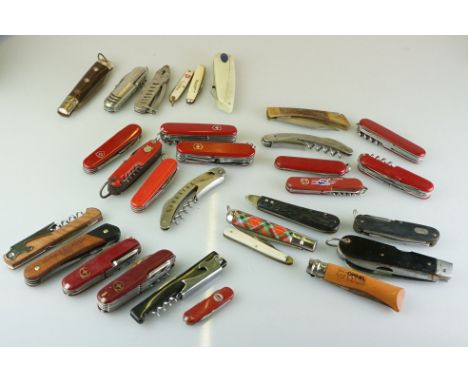 A large collection of mixed pocket penknives to include Victorinox Swiss army examples. 