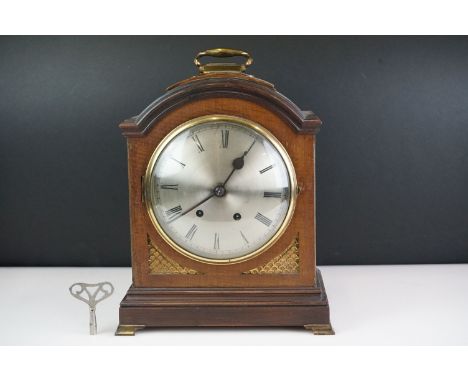 Early 20th Century wooden cased French chiming mantel clock, with silvered convex dial, convex bevelled glass front door, Fre