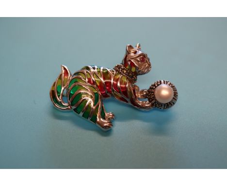 Silver enamelled ruby eyed cat brooch