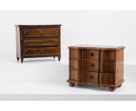 A walnut miniature commode, late 19th century, Continental, the serpentine front having three drawers with knob handles, on c