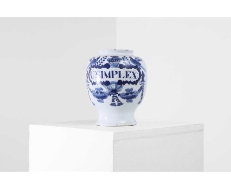 A delftware blue and white drug jar, mid-18th century, probably Lambeth, the jar inscribed 'U:Simplex', within a panel topped