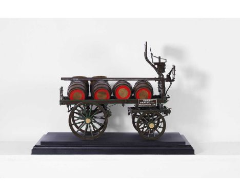 A scale model of a brewer's horse-drawn dray, with planked body and hinged tailgate, driver's seat and footrest, spoked woode