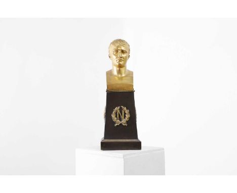 An ormolu and patinated bronze bust of Napoleon attributed to Pierre-Philippe Thomire, c.1806, French, after a model by Antoi