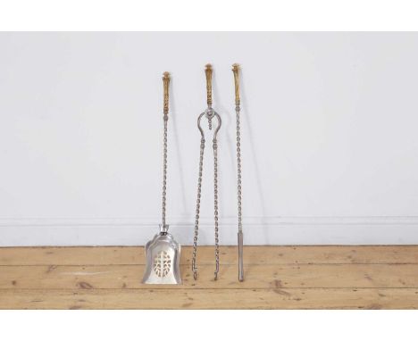 A set of three Regency brass and steel fire tools, c.1840, each with spiral-twist stems,shovel 15cm wide78cm long (3)