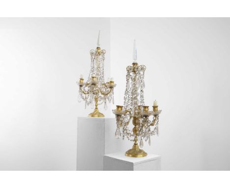 A pair of cut-glass and gilt-metal candelabra, second half of the 19th century, French, each surmounted by a faceted dagger a